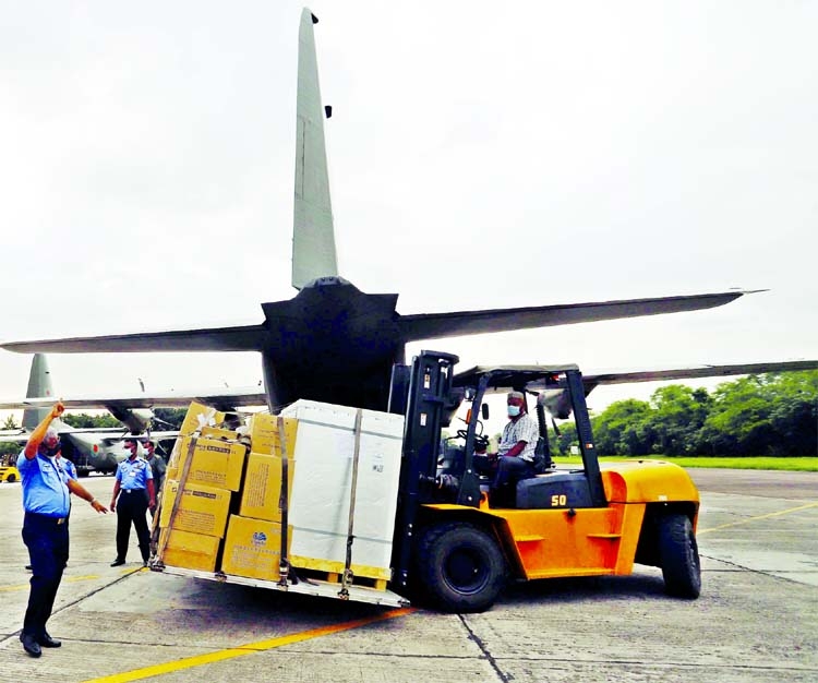 Bangladesh Air Force (BAF) personnel unload 2nd consignment of Sinopharm vaccine 6,00,000 doses that arrived in the capital on Sunday as a gift from China.