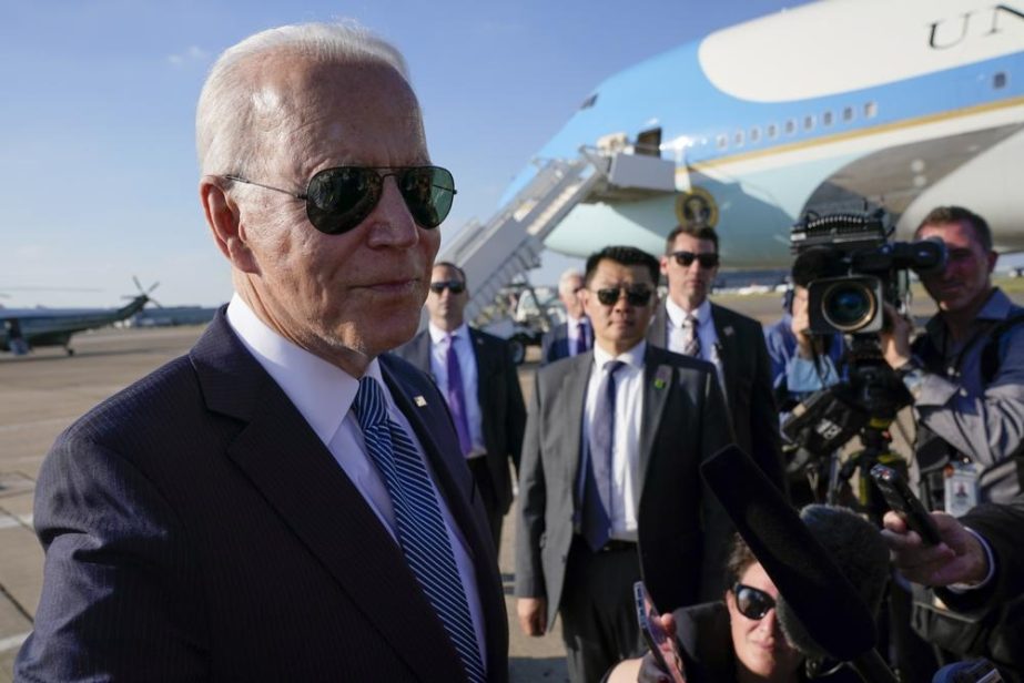 President Joe Biden speaks with reporters before boarding Air Force One at Heathrow Airport in London, Sunday, June 13, 2021. Biden is en route to Brussels to attend the NATO summit.