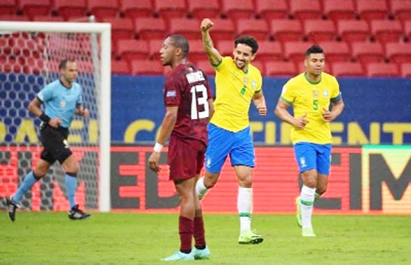 Brazil's Marquinhos (2nd right) celebrates after scoring against Venezuela during the CONMEBOL Copa America 2021 football tournament group phase match at the Mane Garrincha Stadium in Brasilia on Sunday.