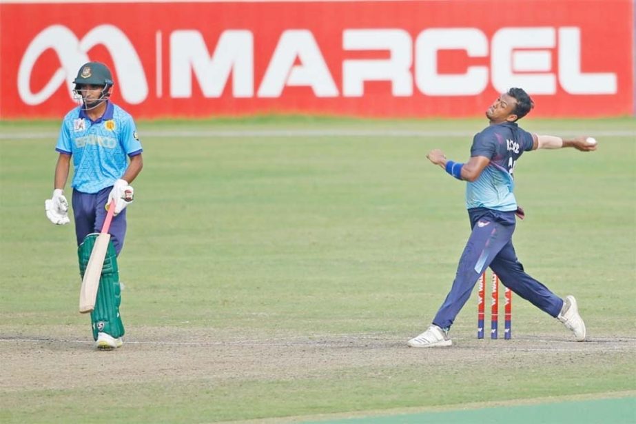 Kamrul Islam Rabbi (right) of Prime Doleshwar Sporting Club, in action against Dhaka Abahani Limited in their match of the Bangabandhu Dhaka Premier League Cricket at the Sher-e-Bangla National Cricket Stadium in the city's Mirpur on Wednesday. R
