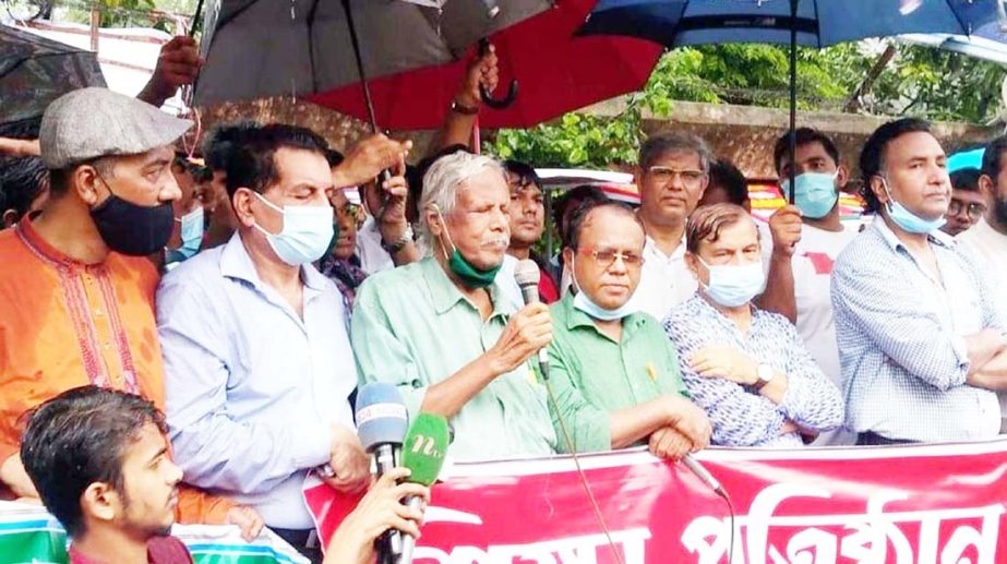 Teachers-Employees-Guardians Forum forms a human chain in front of the Jatiya Press Club on Saturday with a call to open all educational institutions.