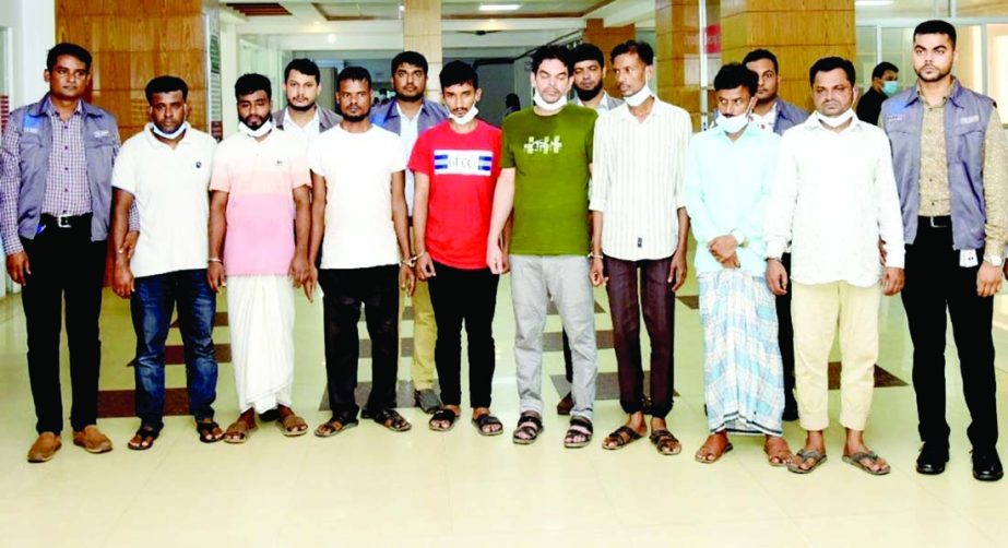 CID police detains 9 members of a gang of human trafficking conducting raids in the capital and other part of the country. The snap was taken from CID office in the city on Tuesday.