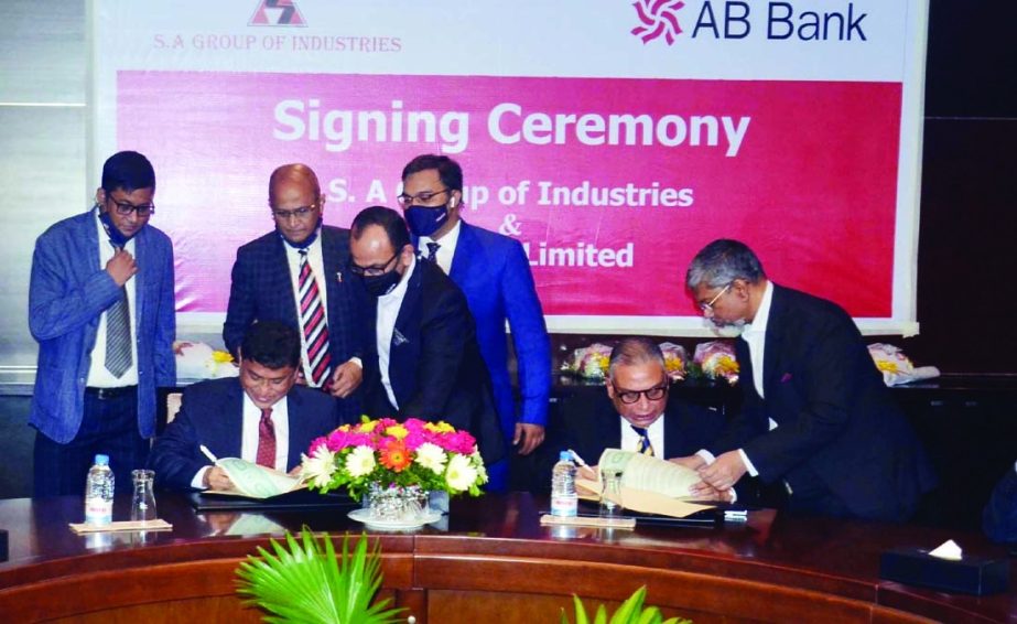 Chairman of SA Group Md. Shahabuddin Alam and Managing Director of AB Bank Ltd Tarik Afzal sign an agreement on payment collection at Radison Blue in Chattogram on Monday. SA Group' salary, bonus and all other benefits will be disbursed through AB Bank a