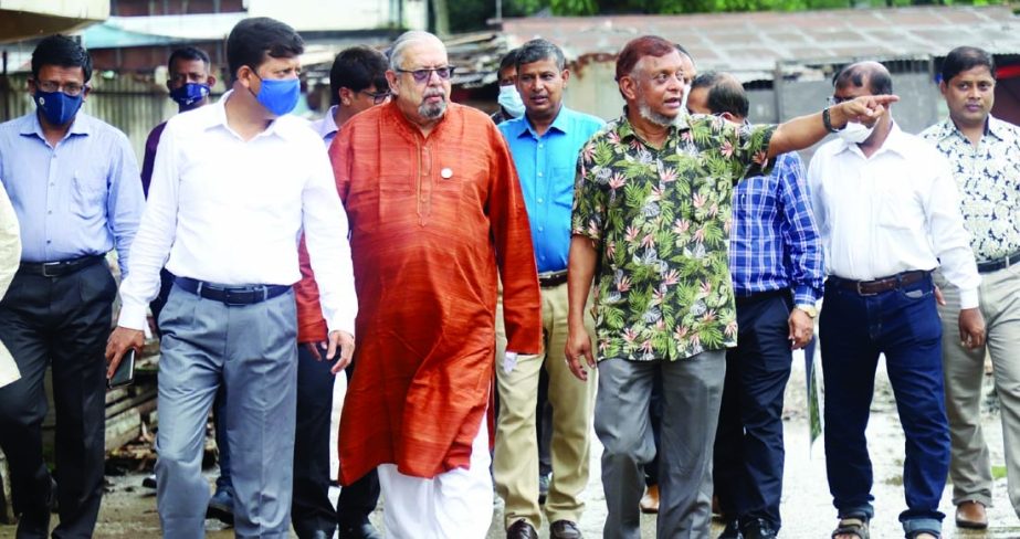 Sylhet city mayor Ariful Haque Chowdhury shows the development works of the city's Dhopadighi to Imran Ahmed, MP, Minister of Expatriates' Welfare and Overseas Employment on Monday.