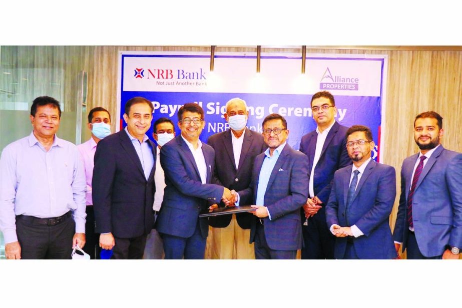 Mamoon Mahmood Shah, Managing Director & CEO of NRB Bank Limited and Syed Razi Haider Rizvi, Managing Director of Alliance Properties Limited (APL), exchanging documents after signing a payroll agreement at APL head office in the capital recently. Under t