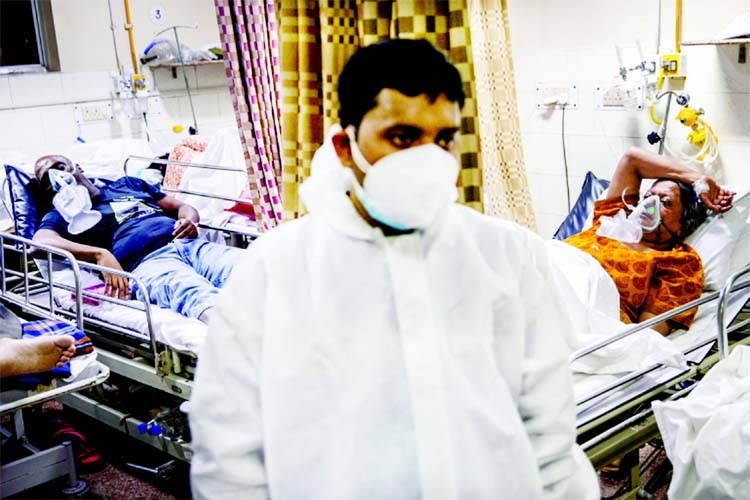 COVID-19 patients being treated inside an overcrowded casualty ward at a hospital in New Delhi
