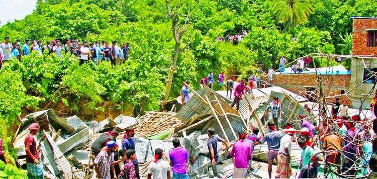 Chattagram District Administration evicts people who live illegally at foothills risking their lives at Lalkhan Bazar area on Wednesday.