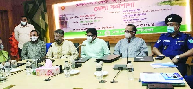 Nesar Ahed, MP from Mouluvi Bazar-3 speaks at a workshop on Monu River Survey held in the conference room of the district administration on Wednesday with the Mouluvi Deputy Commissioner Mir Nahid Hasan in the chair.