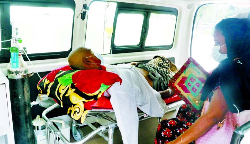 An elderly Covid-19 patient with oxygen mask on face arrives in an ambulance for admission to the Rajshahi Medical College Hospital which had no space on Thursday amid worsening pandemic situation in the country.