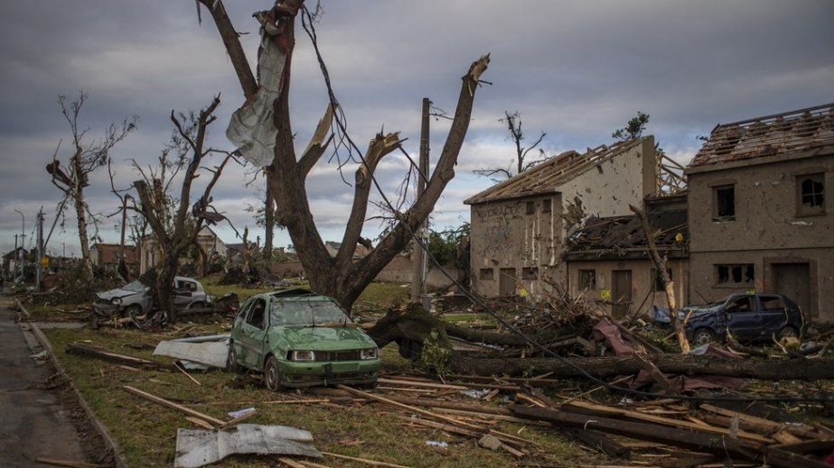 image captionThe village of Mikulcice, just outside Hodonin, looked like a war zone by Friday morning.