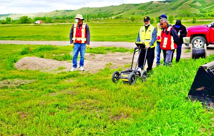 A crew performs a ground-penetrating radar search of a field, where the Cowessess First Nation said they had found 751 unmarked graves, near the former Marieval Indian Residential School in Grayson, Saskatchewan, Canada.
