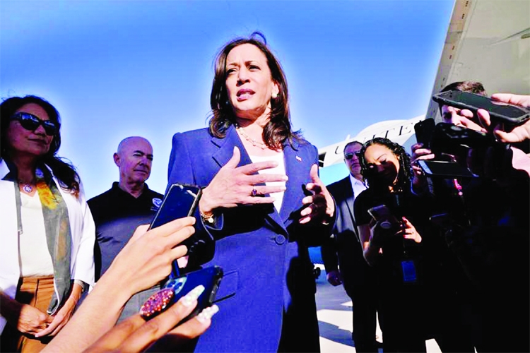 Vice President Kamala Harris talks to the media after stepping off Air Force Two, on Friday on arrival to El Paso, Texas.