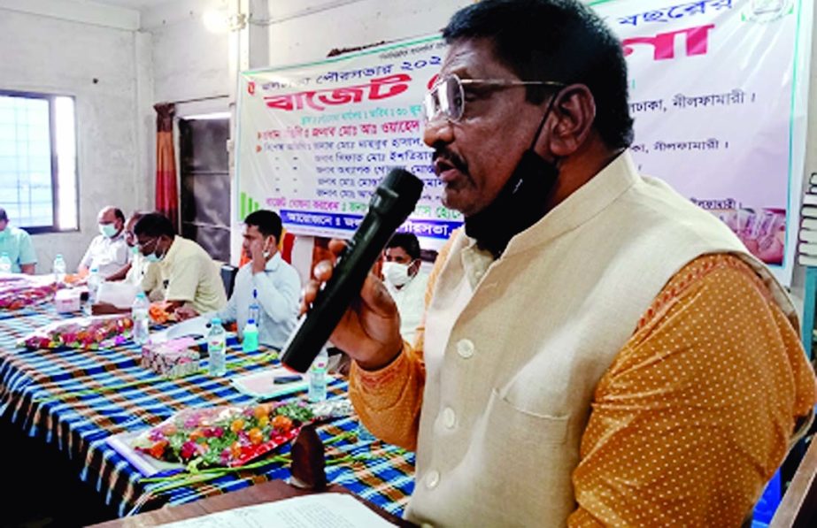 Mayor of Jaldhaka Municipality, Nilfamari presents its budget for FY 2021-22 worth Tk 55 crore 42 lakh at a formal budget session held in the Pauro Office on Wednesday.