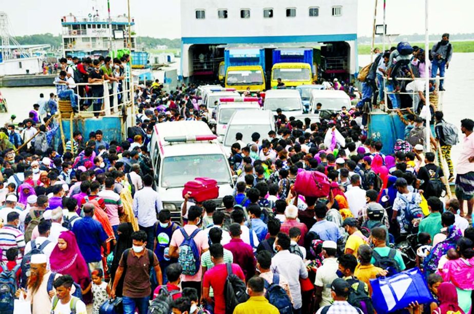 Mad rush for home continued on Wednesday amid limited lockdown across the country. The photo was taken from Shimulia Ferry Ghat.