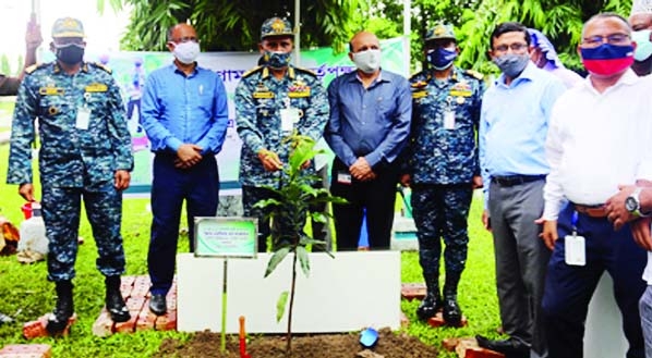 Chairman, Chattogram Port Authority, plants an Amrapali sapling on Port Bhaban premises to inaugurate a tree plantation program on Wednesday.
