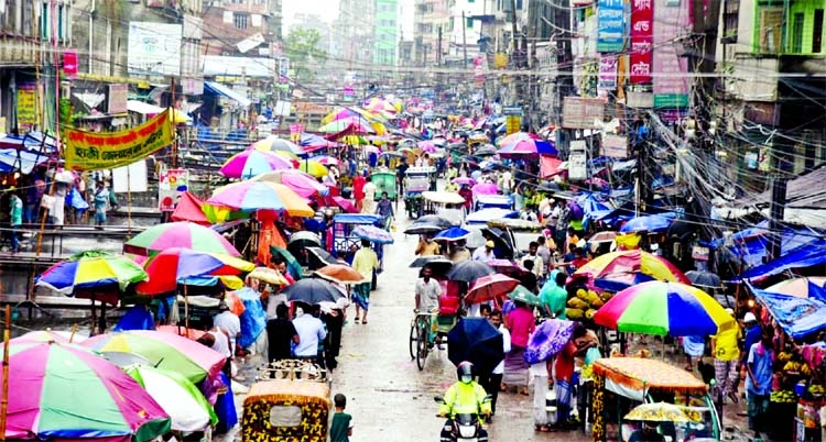 Commoners at a katcha bazaar without maintaining health guidelines during lockdown for corona virus pandemic. The snap was taken from the city's Shanir Akhra on Friday.