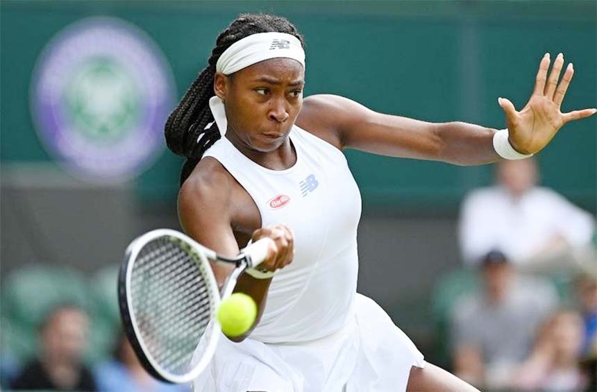 US player Coco Gauff returns against Russia's Elena Vesnina during their women's singles second round match on the fourth day of the 2021 Wimbledon Championships at The All England Tennis Club in Wimbledon, southwest London on Thursday.