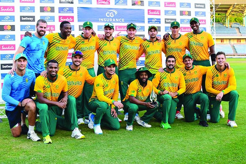 South Africa's players pose with the series trophy at the end of the 5th and final T20I between West Indies and South Africa at Grenada National Cricket Stadium, Saint George's, Grenada on Saturday.
