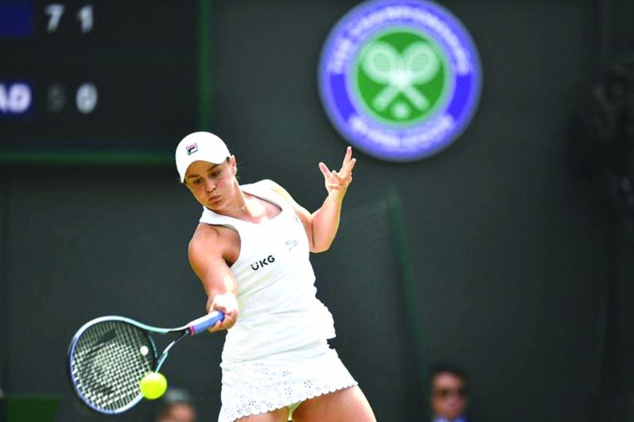 Australia's Ash Barty returns to Czech Republic's Barbora Krejcikova during their women's singles fourth round match on the seventh day of the 2021 Wimbledon Championships at The All England Tennis Club in Wimbledon, southwest London on Monday.