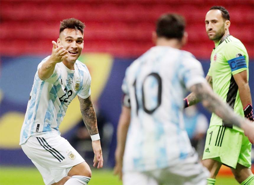 Argentina's Lautaro Martinez celebrates scoring their first goal with Lionel Messi during the Copa America 2021 semi-final against Colombia at Estadio Mane Garrincha, Brasilia, Brazil on Tuesday.