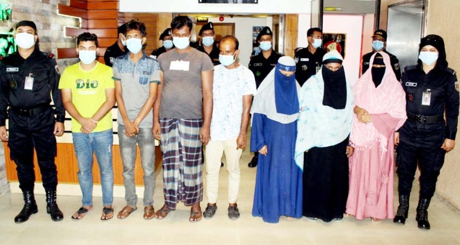RAB-4 arrested 7 people including the chief of Bangladeshi agent of international human trafficker from the Mediterranean Sea to Europe Rubel Syndicate on Sunday. This photo was taken from RAB Media Centre. NN photo