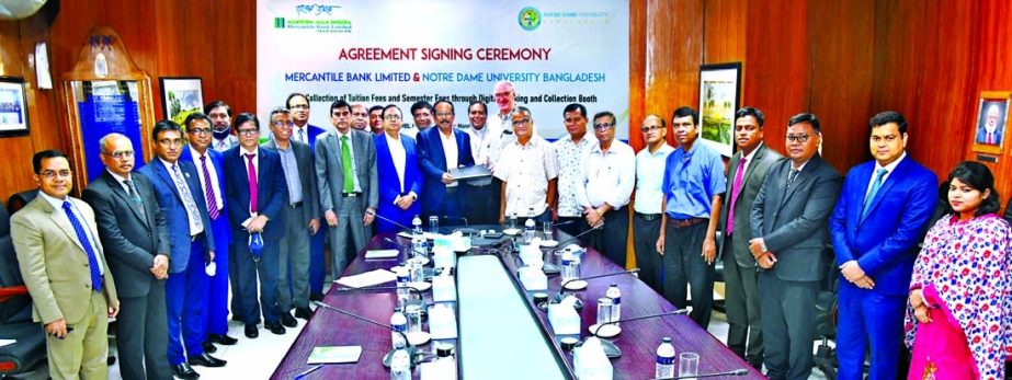 Md. Quamrul Islam Chowdhury, Managing Director & CEO of Mercantile Bank Limited (MBL) and Dr. Father Patrick D. Gaffney, Vice Chancellor of Notre Dame University, exchanging document after signing an agreement at the bank's head office in the capital on