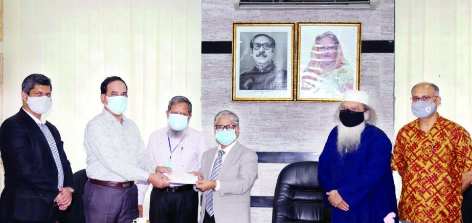 Director and CEO of Fair Group Mutasim Daian and MD of Royal Tulip Sea Pearl Beach Resort & Spa Aminul Haque Shamim hand over cheques of Tk 6 lakh and Tk 10 lakh respectively to DU Vice-Chancellor Dr. Md.Akhtaruzzaman on Wednesday to provide scholarships