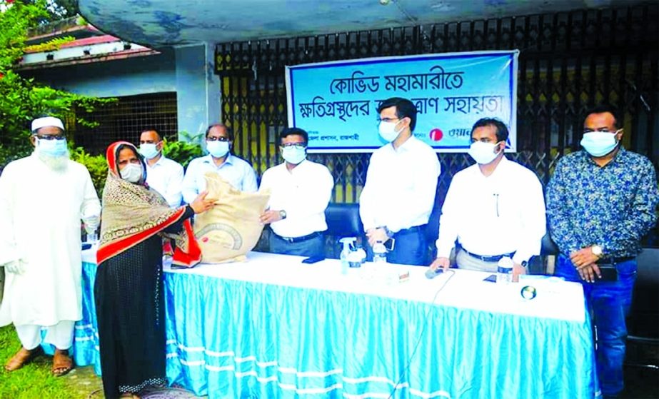 Rajshahi District Commissioner Abdul Jalil, distributing relief among 2,150 underprivileged families as part the CSR of One Bank Limited at Riverview High School in Rajshahi on Monday as chief guest. Senior officials of the bank were present.
