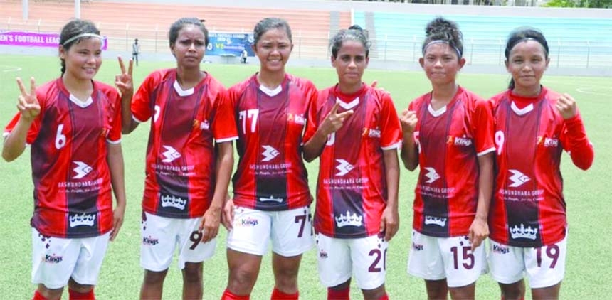 Players of Bashundhara Kings showing victory sign after defeating Cumilla United in their match of the Women's Football League at the Bir Shreshtha Shaheed Sepoy Mohammad Mostafa Kamal Stadium in the city's Kamalapur on Thursday.