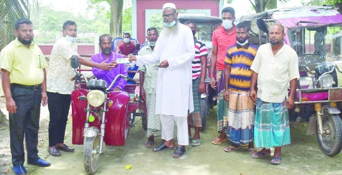 Local UP Chairman of Noshipur Union of Gabtoli upazila in Bogura disrict Alhaj Nazrul Islam Mintu Sikder distributes per copita Tk. 50 among Jobless and destitue Auto-van owners and worker families on Thursday.