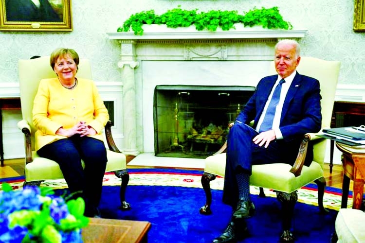 US President Joe Biden holds a bilateral meeting with German Chancellor Angela Merkel in the Oval Office at the White House in Washington, US, on Thursday.