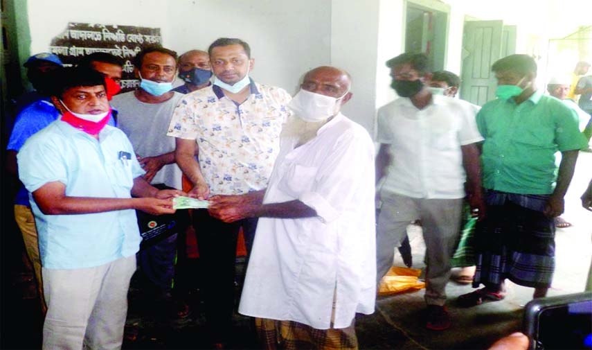 On the occasion of Eid-ul-Azha, Chairman of Magura Binod Union in Tarash, Sirajganj Lecturer Atiqul Islam Bulbul on Sunday distributes Tk 500 each among 750 helpless, destitute, extremely poor, van and rickshaw drivers from the government allocation.