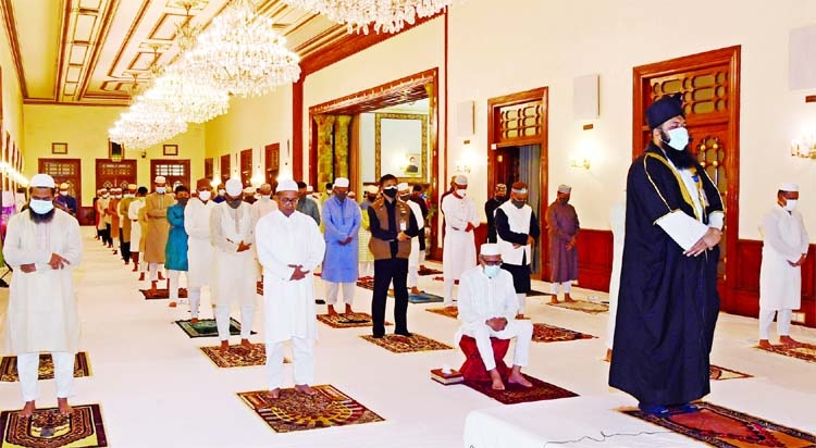 President Abdul Hamid says Eid-ul-Azha prayers at the Hallway of Bangabhaban on Wednesday.