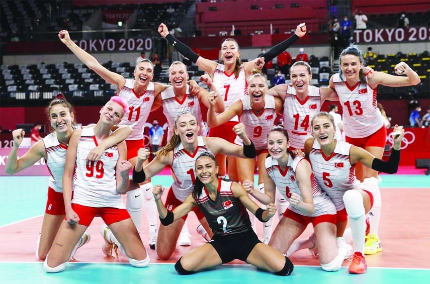 Team Turkey celebrate winning the women's volleyball preliminary round match between China and Turkey at the Tokyo 2020 Olympic Games in Tokyo, Japan on Sunday.