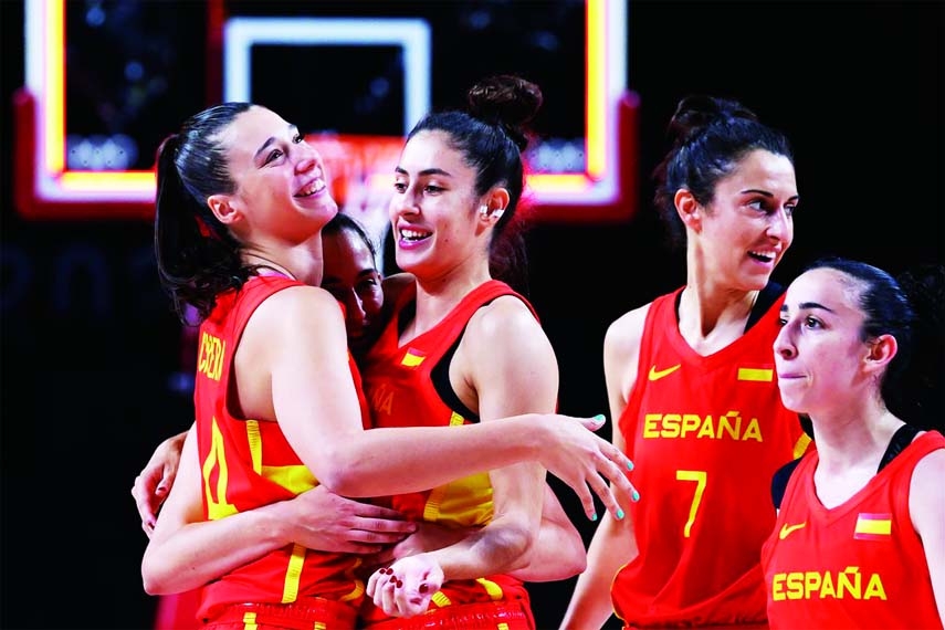 Spain players celebrate after winning the match during the Tokyo 2020 Olympics Basketball (Women's - Group A) match between South Korea and Spain at Saitama Super Arena, Saitama, Japan on Monday.