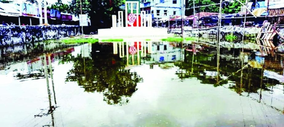 Located in the heart of Chitalmari, the Shaheed Minar of the upazila is in a dilapidated condition as no renovation work has been done for a long time. Front yard of the Shaheed Minar remains submerged in water almost all the year round. Pile of garbage