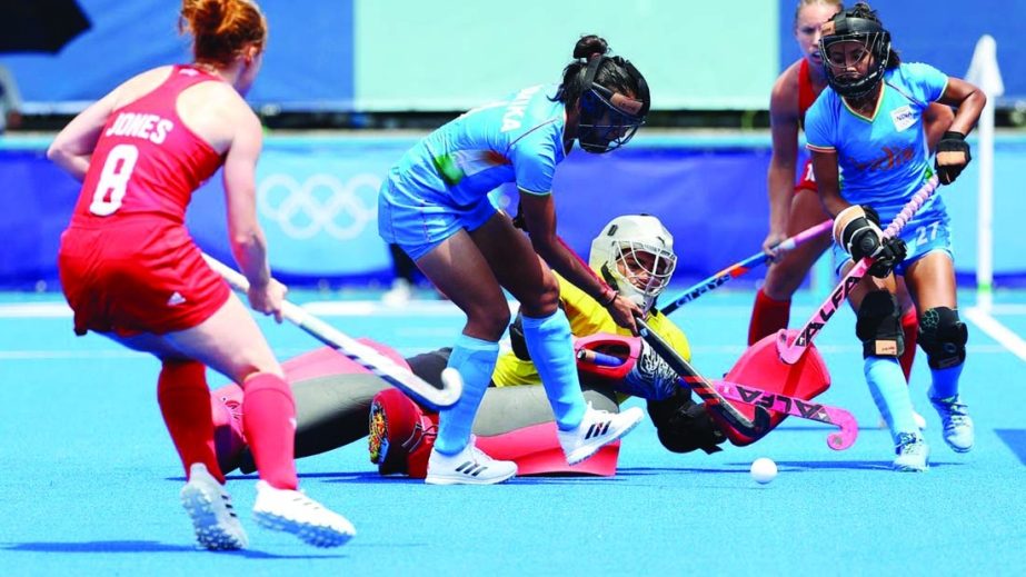 Monika Malik (center) of India in action as they defend against Britain during the Tokyo 2020 Olympics Hockey (Women's Pool-A) at Oi Hockey Stadium, Tokyo, Japan on Wednesday.