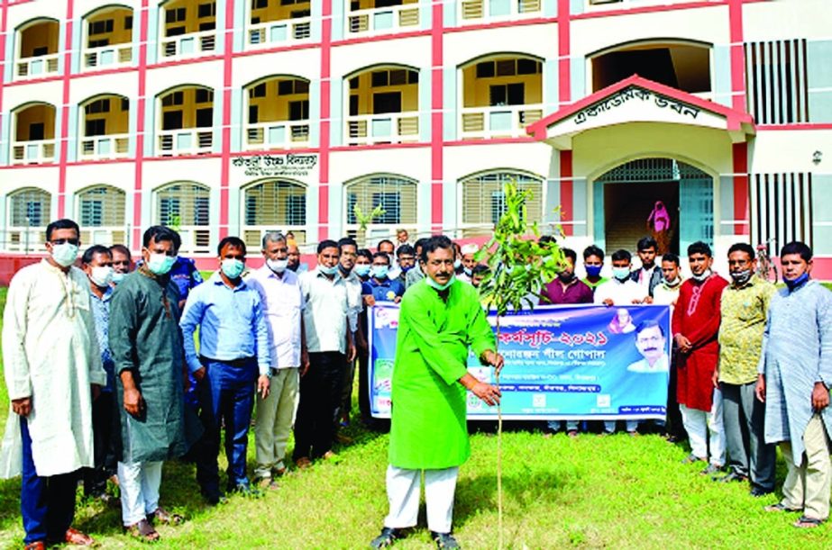 Monoranjan Shil Gopal, MP from Dinajpur-1 constituency inaugurates a tree plantation program at Bottoli High School ground of Sator Union under Birganj upazila on Tuesday.