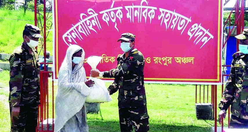 Captain Mahfuzur Rahman Tamal of 34 East Bengal of the 8th Infantry Division of the Rangpur Region of the Army as chief guest distributes humanitarian assistance to 185 distressed and helpless families in Char Gokunda village of Lalmonirhat Sadar Upazila