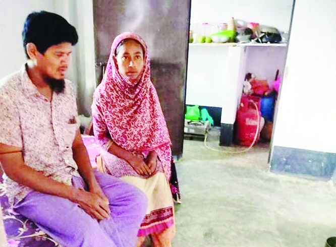 Blind Sumanand his wife in their new dwelling house in Matlab Dakhshin UZ.