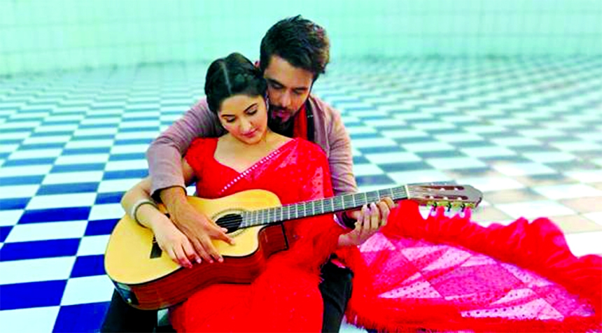 Siam Ahmed and Pori Moni in a scene from the film
