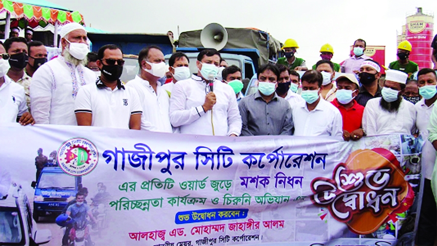 Mayor of the Gazipur City Corporation Adv. Mohammad Jahangir Alam speaks while inaugurating a mosquito eradication cleanliness program and combing operation of the city corporation on Saturday. Among others, CEO of the corporation Aminul Islam, councilors