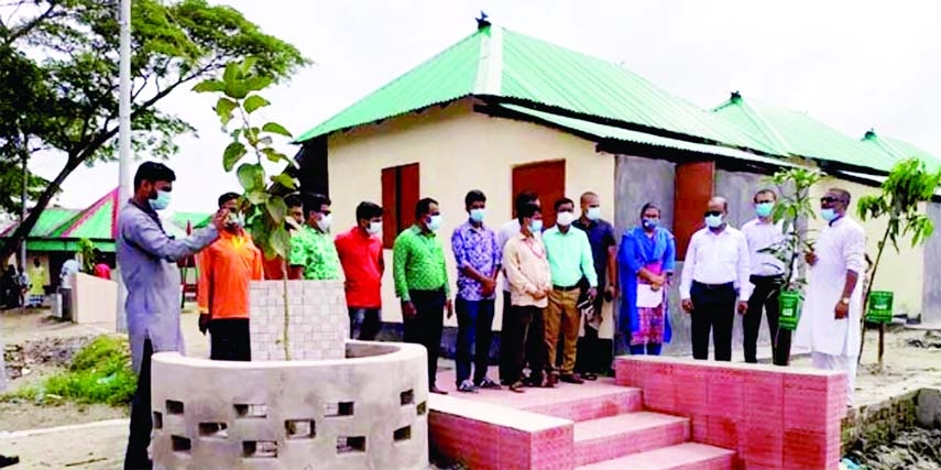 Dr. Syeda Zakia Noon Lipi, MP hands over homes as gifts of Prime Minister to 22 destitute families in a spectacular housing complex in Josodal Asrayan Project in Kishoreganj on Friday. Among others, Deputy Commissioner Mohamad Shamim Alam was present on t