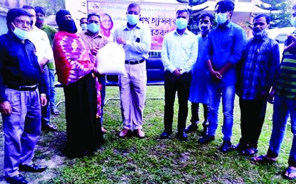 Additional Deputy Commissioner (General) of Panchagarh Azad Jahan as chief guest of a program distributes 10 kgs of rice among each of the 60 jobless and distressed people in Panchagarh on Sunday as humanitarian assistance taken by Bangabandhu Shishu Kish