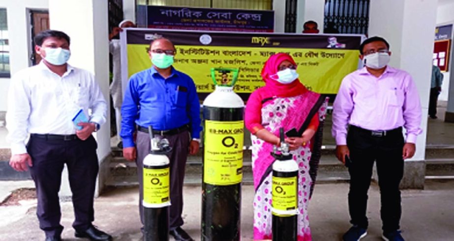 On behalf of Engineers Institutions, Bangladesh, Engineer Mohammad Hossain, DG, Power Cell hands over 60 Oxygen Cylinders to Deputy Commissioner of Chandpur Anjana Khan Majlish in a simple ceremony held at the DC office on Sunday afternoon.