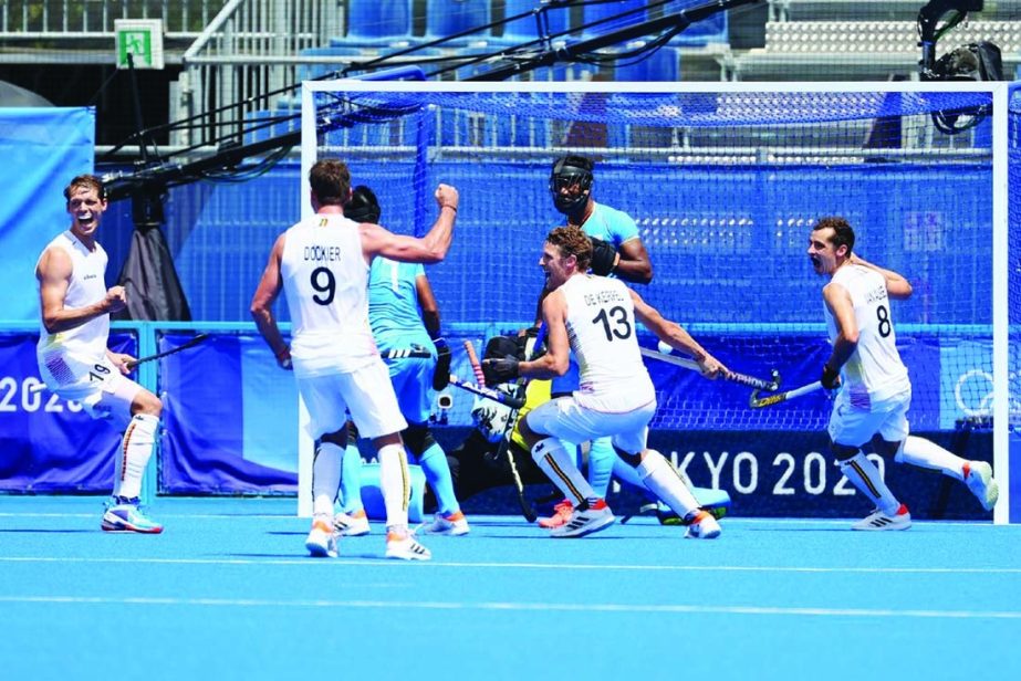 Players of Belgium celebrate a goal scored by Loick Luypaert (left) of Belgium during the Tokyo 2020 Olympics hockey men's semifinal against India at Oi Hockey Stadium, Tokyo, Japan on Tuesday.