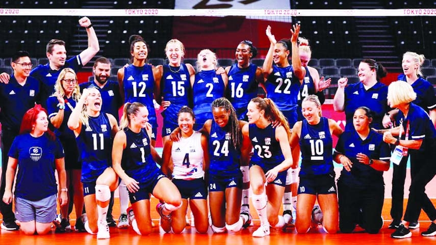 Team members of the United States pose for a photo after the match of the Tokyo Olympics volleyball women's quarterfinal against Dominican Republic at Ariake Arena in Japan on Wednesday.