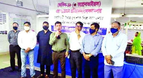 Syed Nazrul Islam, first vice-president of BGMEA speaks while inspecting corona infection control activities at the factory of Messrs. Mirzabu Limited in Sagarika BSIC Industrial Area of the city on Wednesday. He called on the health department to expedit