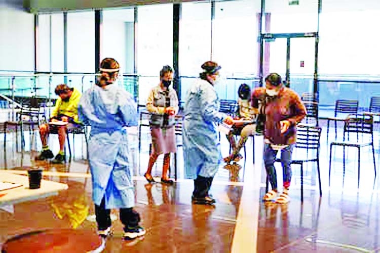 Medical staff assist members of the public in the waiting area at a Covid vaccination clinic as Sydney experiences an extended lockdown.