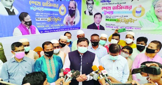 Mayor of the Gazipur City Corporation Adv. Mohammad Jahangir Alam speaks at the inauguration program of mass corona vaccination launched at the city's 57 wards simultaneously in a ceremony held at Kahilkur Badshah Mian Agrani High Scholl at 38 No.3 on Sa